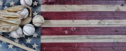 Vintage baseball objects on rustic USA wooden flag