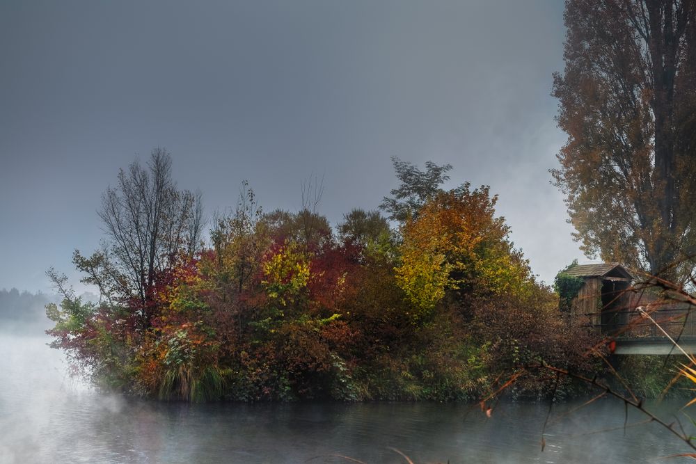 Mist raising from water on overcast day
