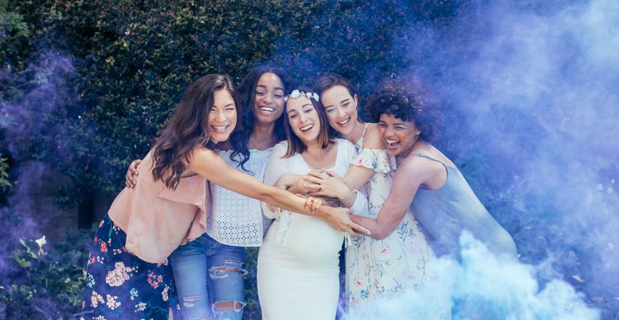 Group of happy female friends at baby shower