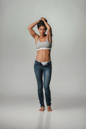 Woman in her jeans in studio shoot