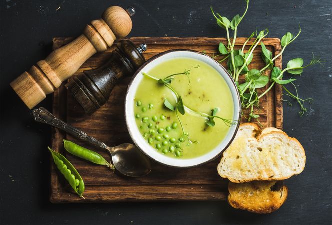 Top view of pea soup with bread