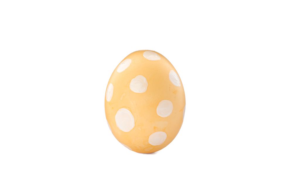 Decorative easter egg isolated on light background. Festive tradition