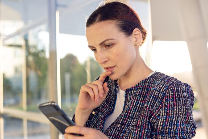 Smiling businesswoman answering phone call