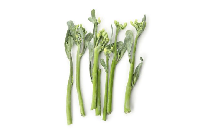 Fresh green broccolini isolated on plain background