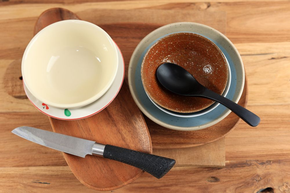 Ceramic Bowl, Wooden Plate, Knife, Spoon, and other Kitchen Equipment