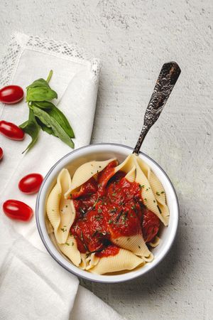 Big pasta shells cooked with tomato sauce