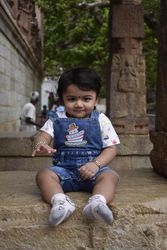 Young Indian girl sitting on the floor
