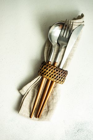 Cutlery set wrapped with napkin and ring