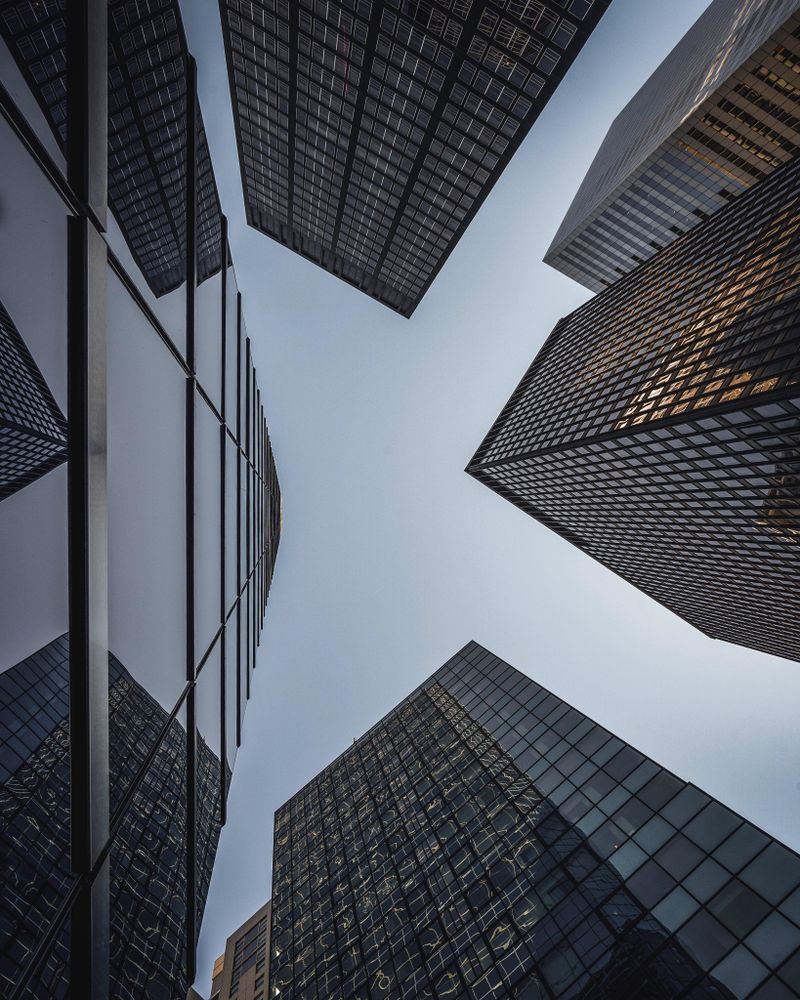 Low angle view of glass skyscrapers in Rotterdam, Zuid-Holland, Netherlands