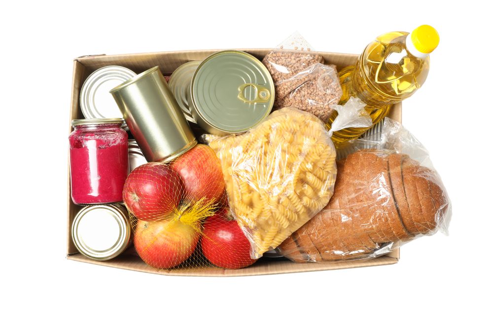 Donation box isolated on plain background. Paper box with food