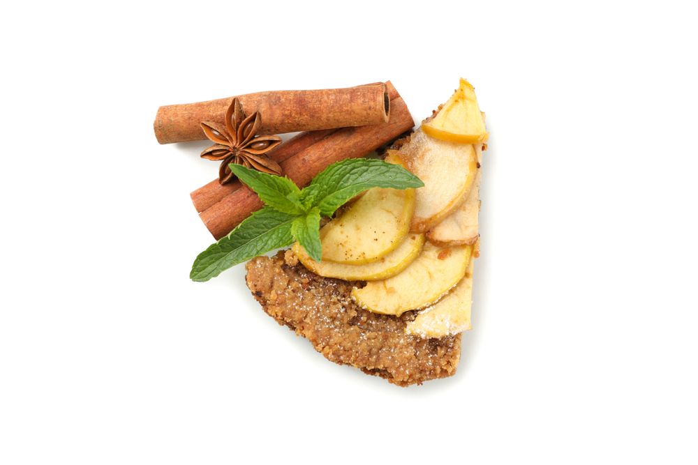 Piece of tasty apple pie isolated on neutral background. Homemade food