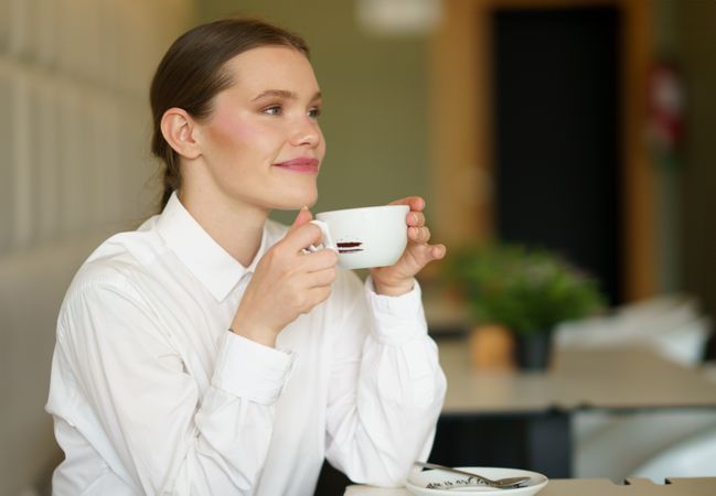 Woman relaxing with coffee