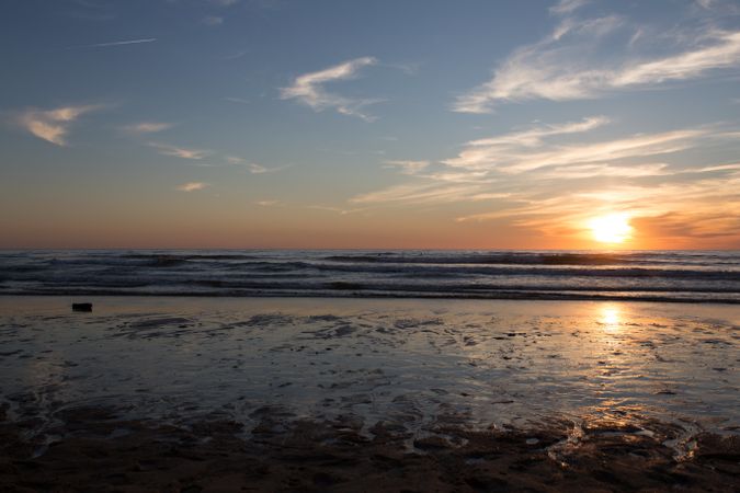 Picturesque view of sandy beach at sunset