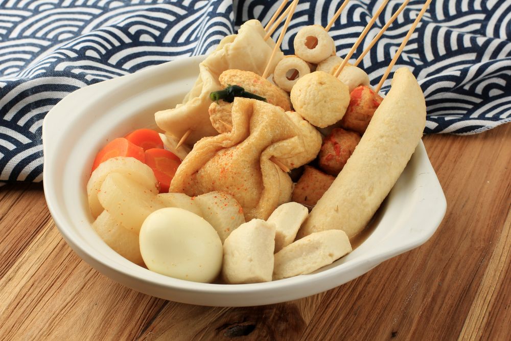 Meal of Japanese oden, skewers of dumplings and seafood