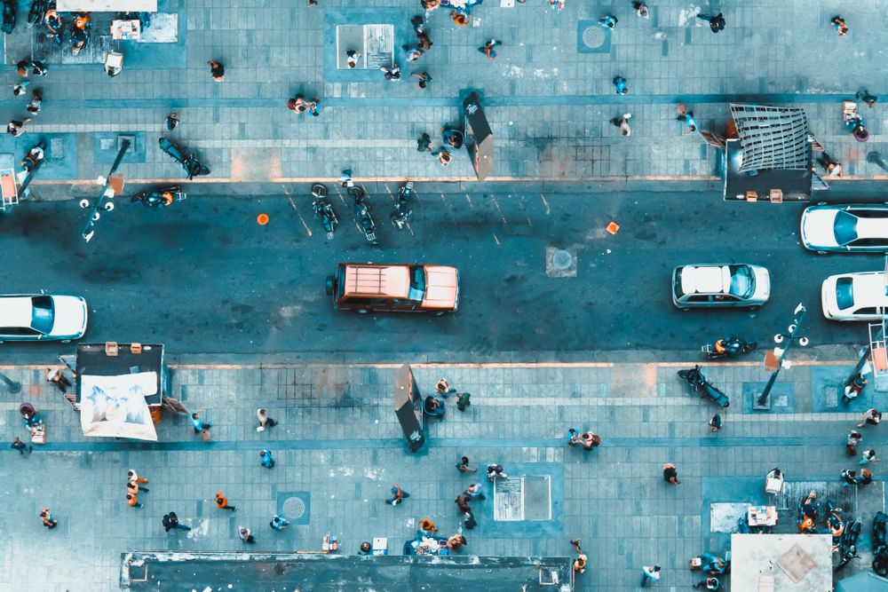 Aerial view photo of people and cars on street