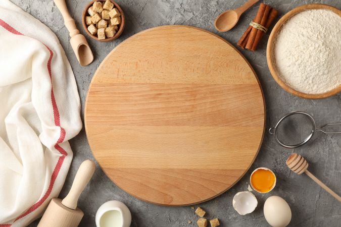 Composition with different kitchen cutlery on gray background, top view