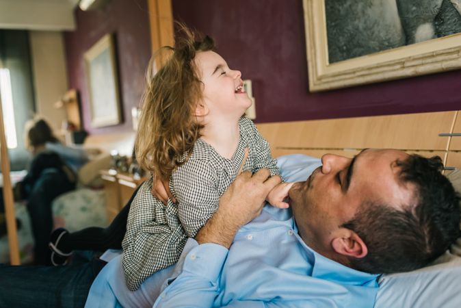 Father playing with daughter