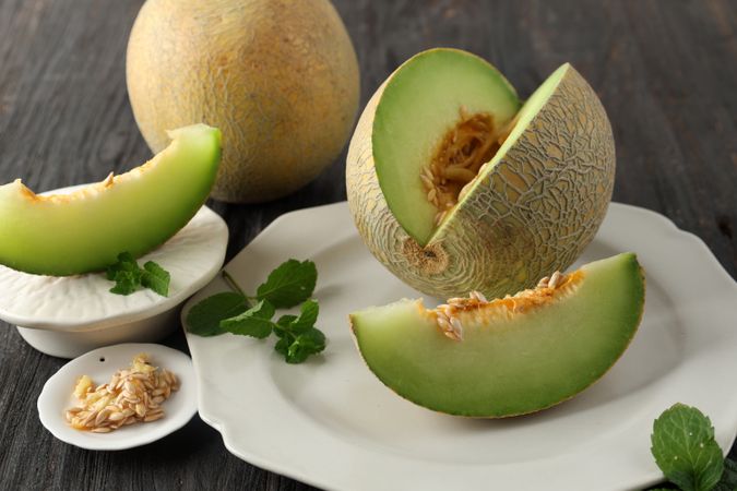 Close Up Sliced Melon on Ceramic Plate