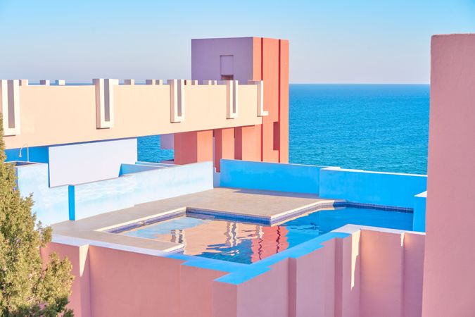 Compact pool on roof of building of geometric shapes