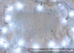 Snowy background composition with decorative Christmas lights 5w3wZ5