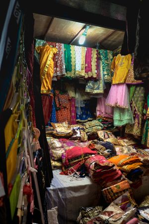 Looking into a fabric stall on a street market