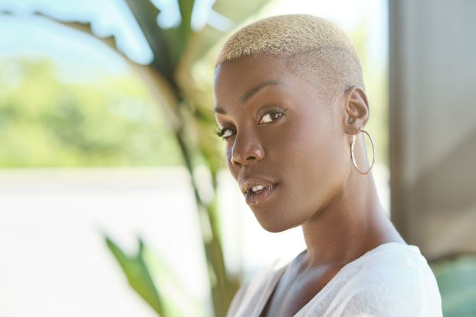 Pensive Black woman looking at camera