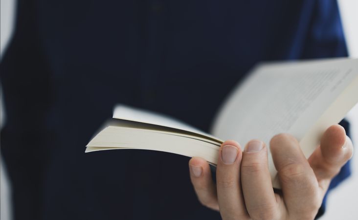 Man Reading Book Close-Up
