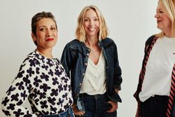 Three older women standing together in photo studio