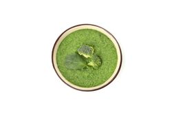 Looking down at top of green broccoli soup