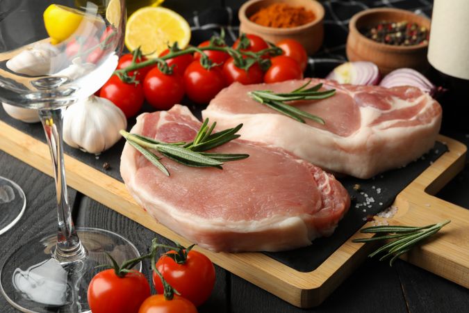Composition with raw meat and ingredients. Cooking steak concept