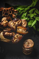 Dates fruits with walnuts, mint and cinnamon for Ramadan