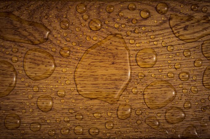 Water drops on wooden plank