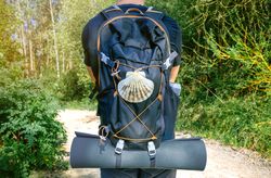 Unrecognizable pilgrim of Saint James way from behind