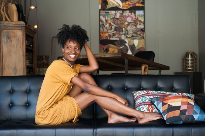 Black woman in yellow dress