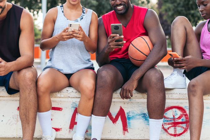 Using the smartphone on the court after a basketball game