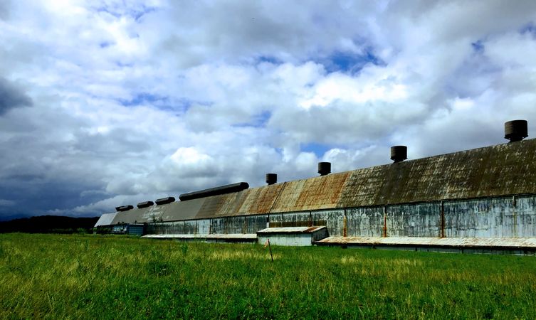 Urban Relic: Abandoned Factory in Pittsburgh under Cloudy Skies