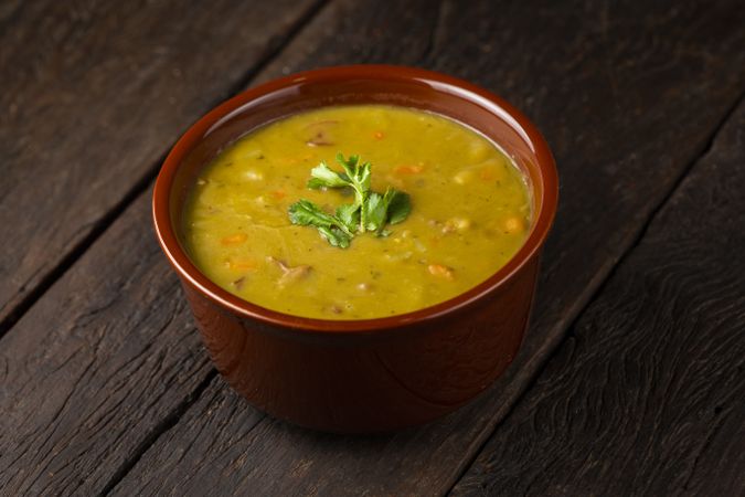 Pea soup. Bowl with pea soup on the table