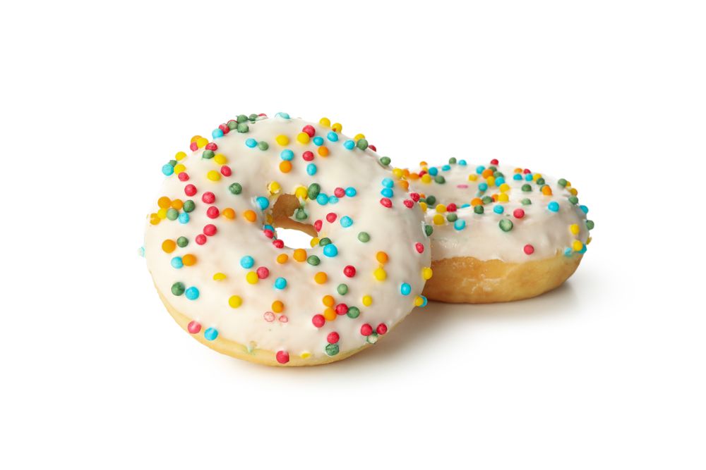 Tasty baked donuts isolated on blank background