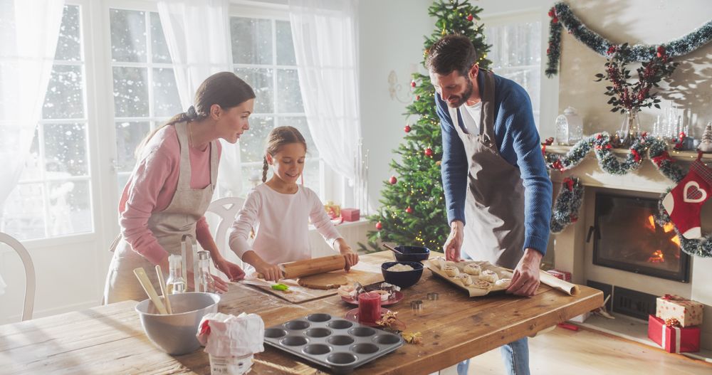Parents and Child Baking Together During Christmas.