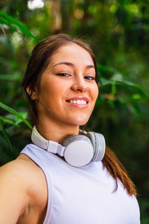 Smiling woman with the headphones