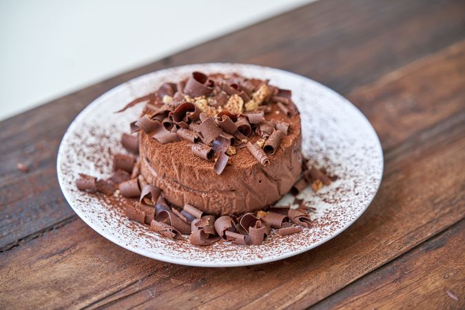Tasty chocolate cake decorated with shavings