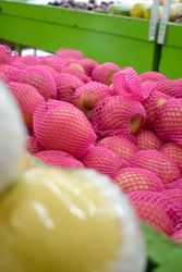 Pear fruit pack wrapped and for sale in market store