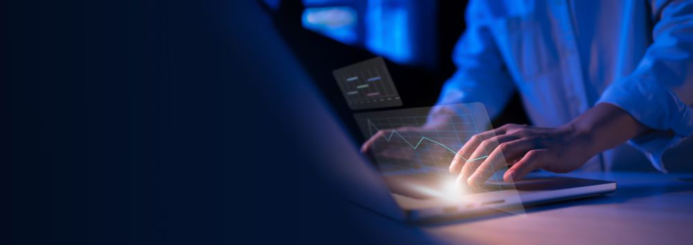 Night-time business analytics on laptop banner