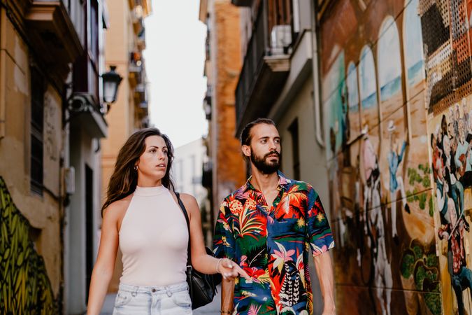Loving couple on street in summer time