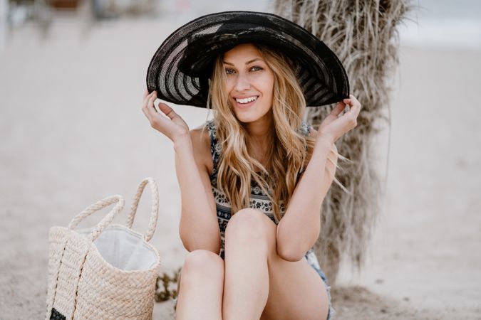 Young female relaxing on beach