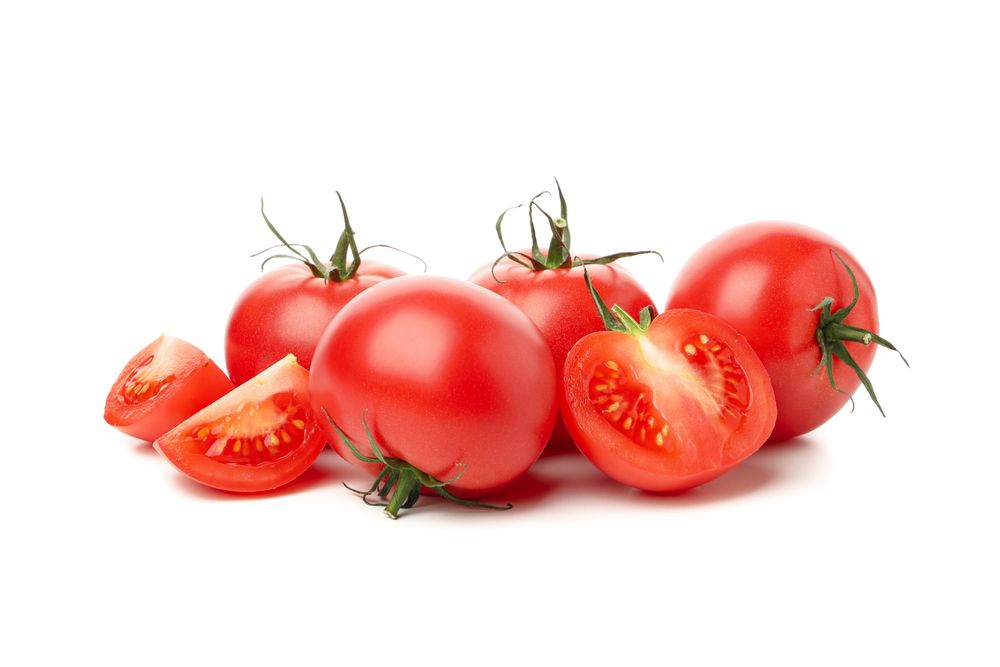 Fresh ripe tomatoes isolated on plain background
