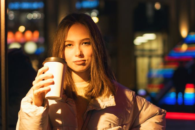 Woman enjoying nightlife in city