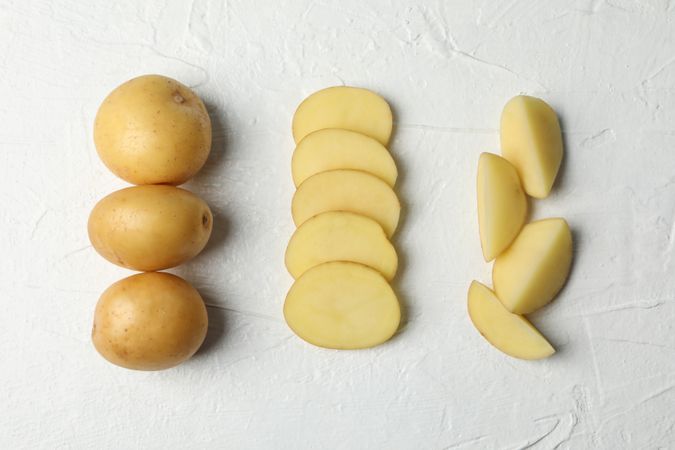 Potatoes cut in different ways in three lines