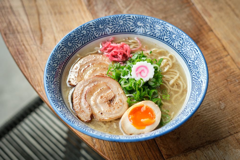 Bowl with tasty ramen in cafe