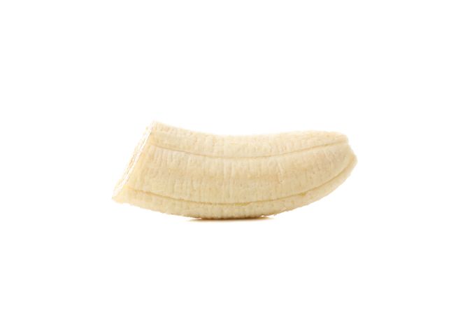 Banana slice isolated on blank background. Fresh fruit
